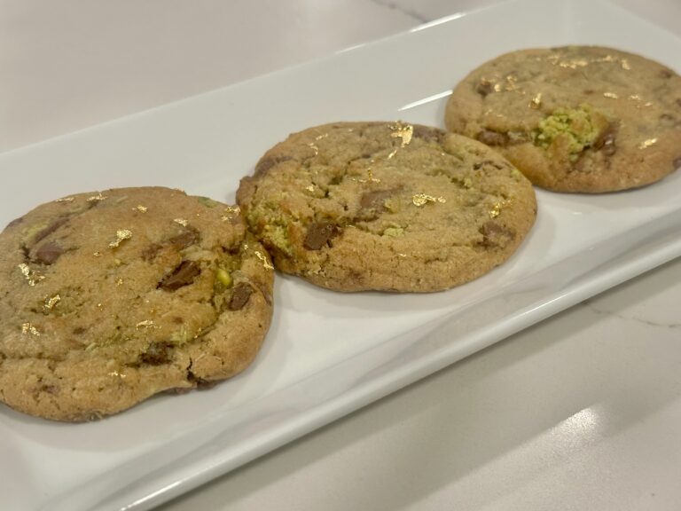 Dubai Chocolate Chip Cookies with pistachio cream, toasted kataifi, chocolate chunks, and edible gold flakes.
